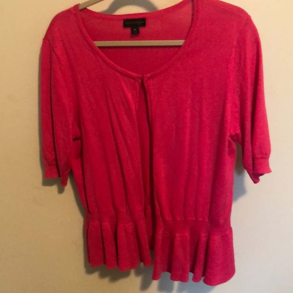Pink peplum sweater.